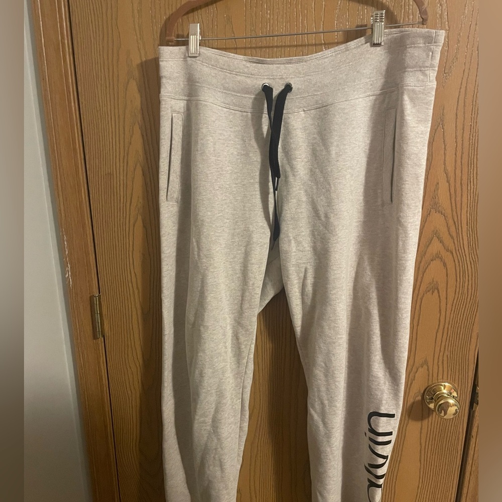NWOT Calvin Klein Performance Cream Drawstring Joggers with Side Script Logo
